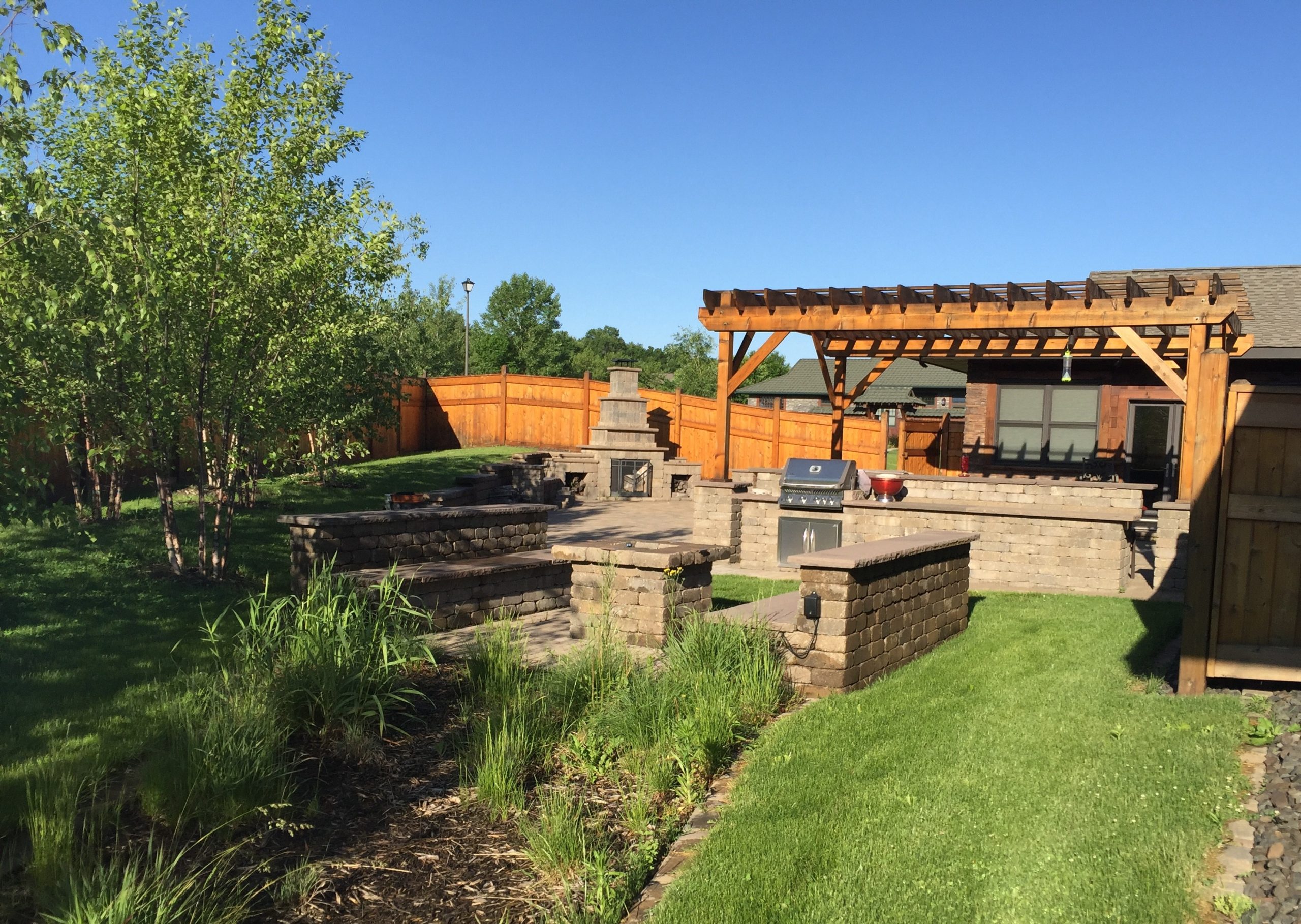 Outdoor Kitchen Fire Table Rain Garden in Minnesota